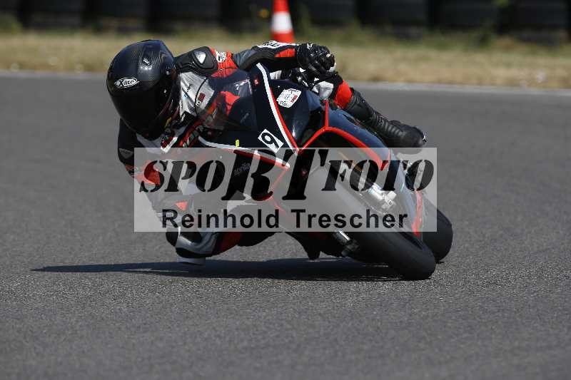 /Archiv-2023/28 05.06.2023 Moto Club Anneau du Rhin/rouge-expert/9